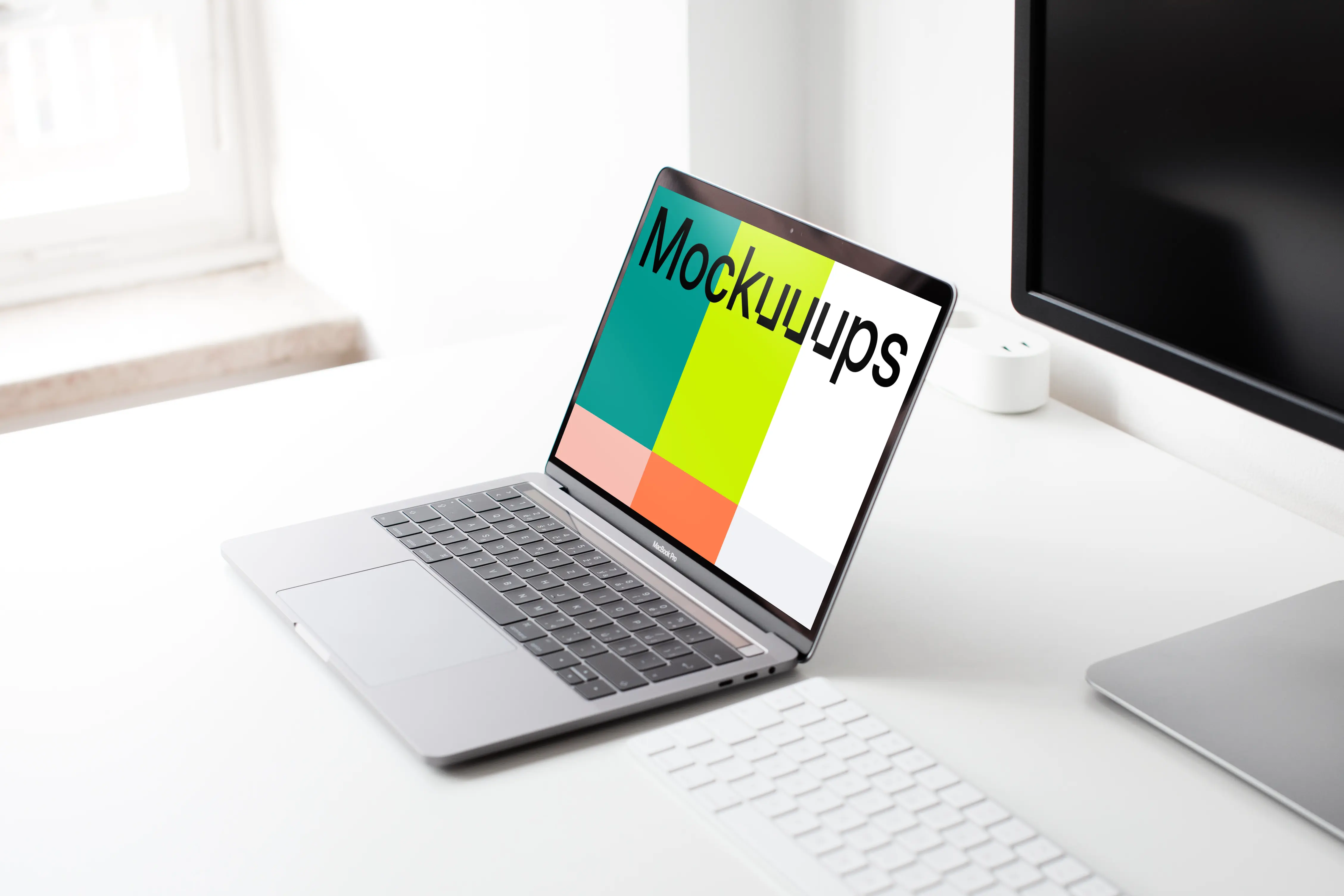 Macbook Pro mockup  in the bright office