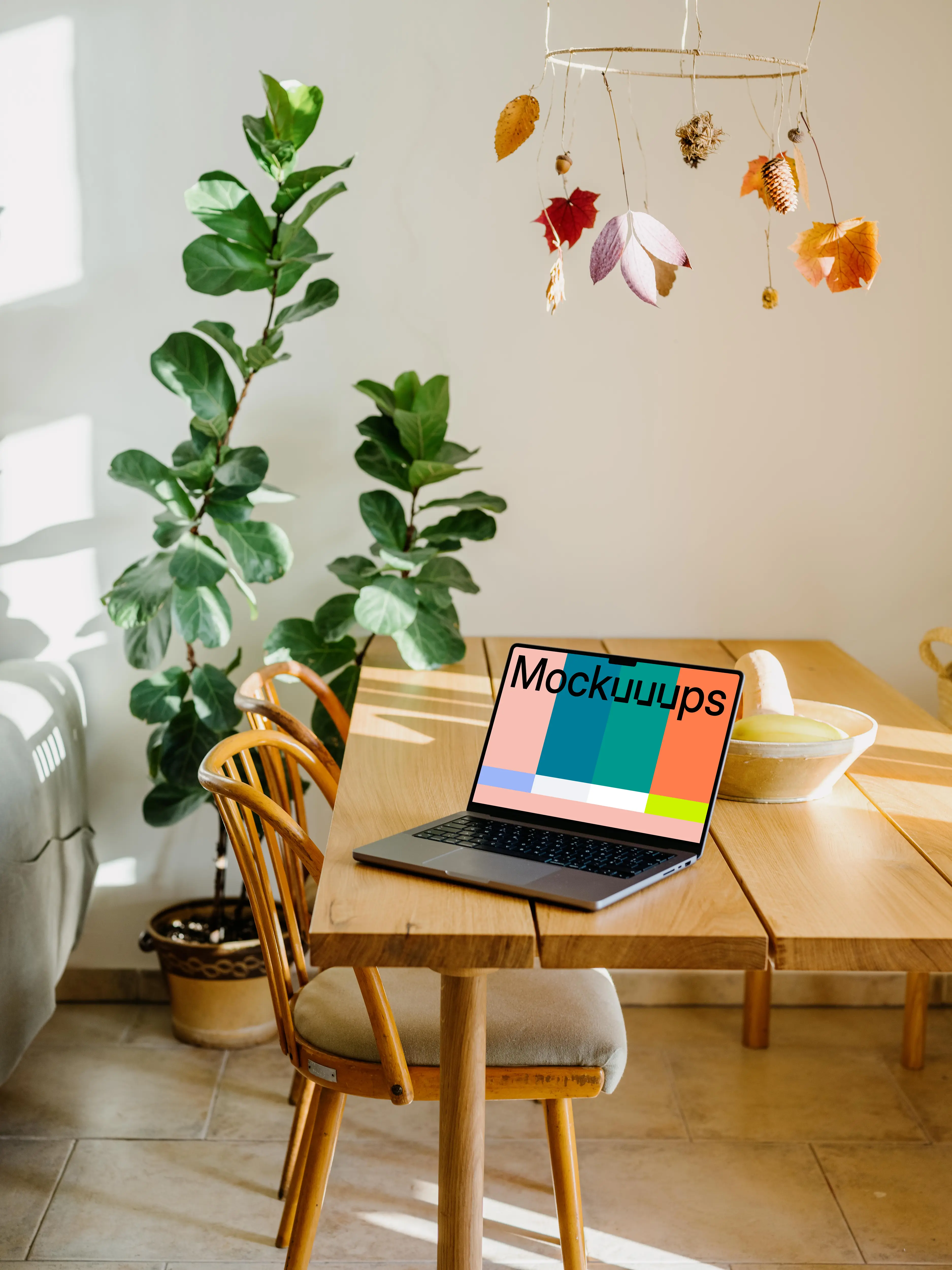 MacBook Pro Mockup on a wooden dining table