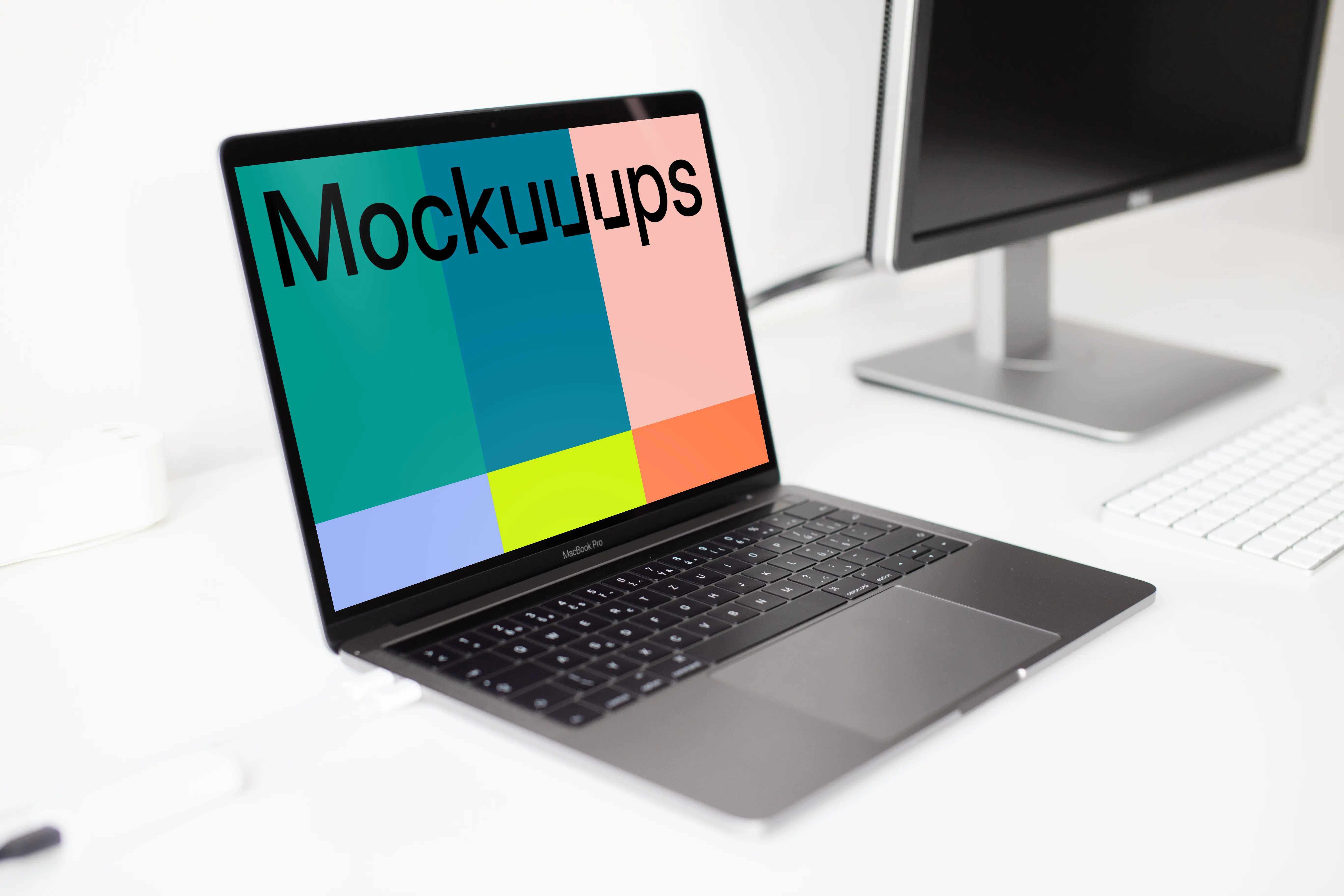 Macbook Pro mockup on the white table