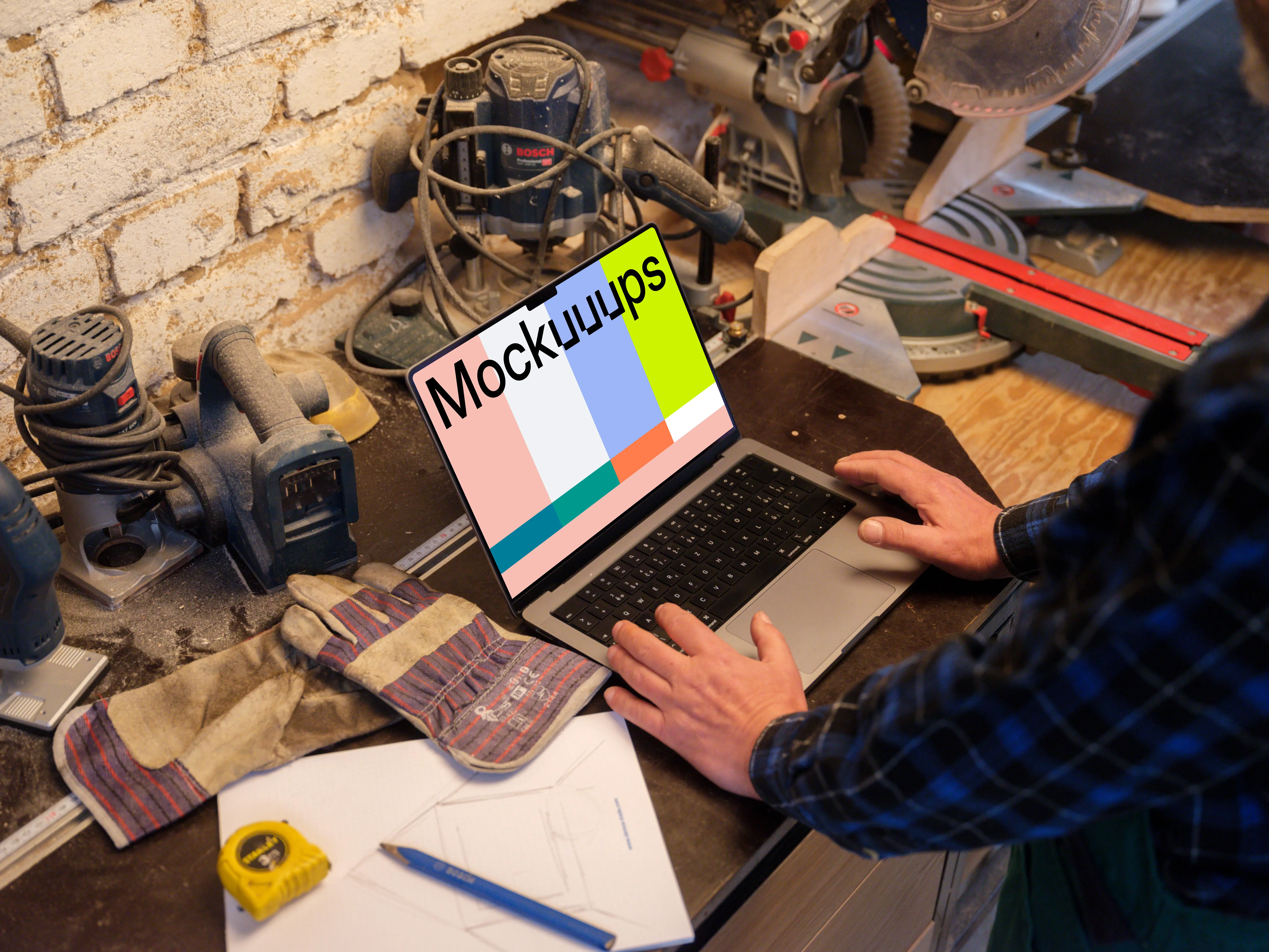 Mechanic working on a MacBook Pro mockup