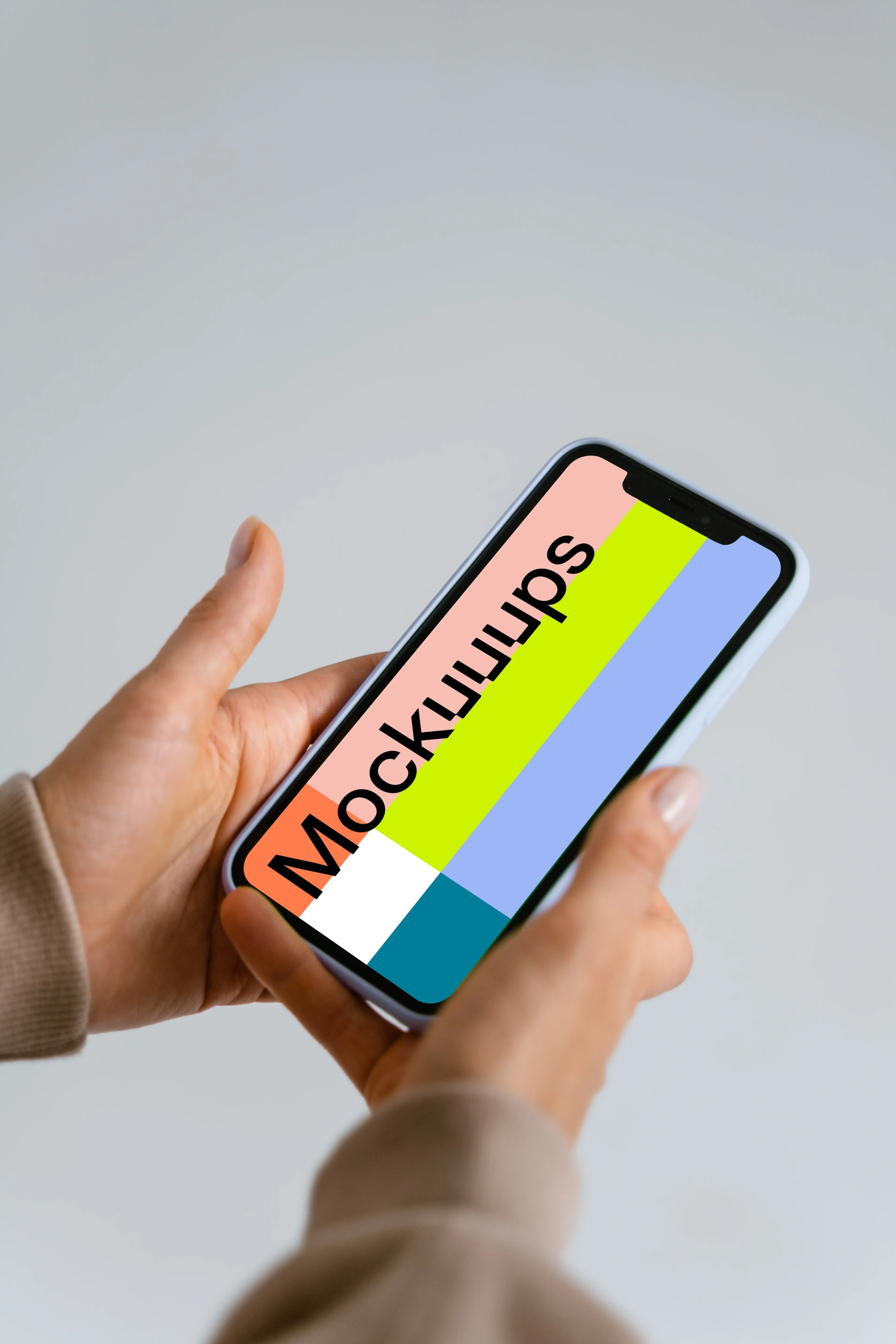 Minimalistic iPhone mockup held by user