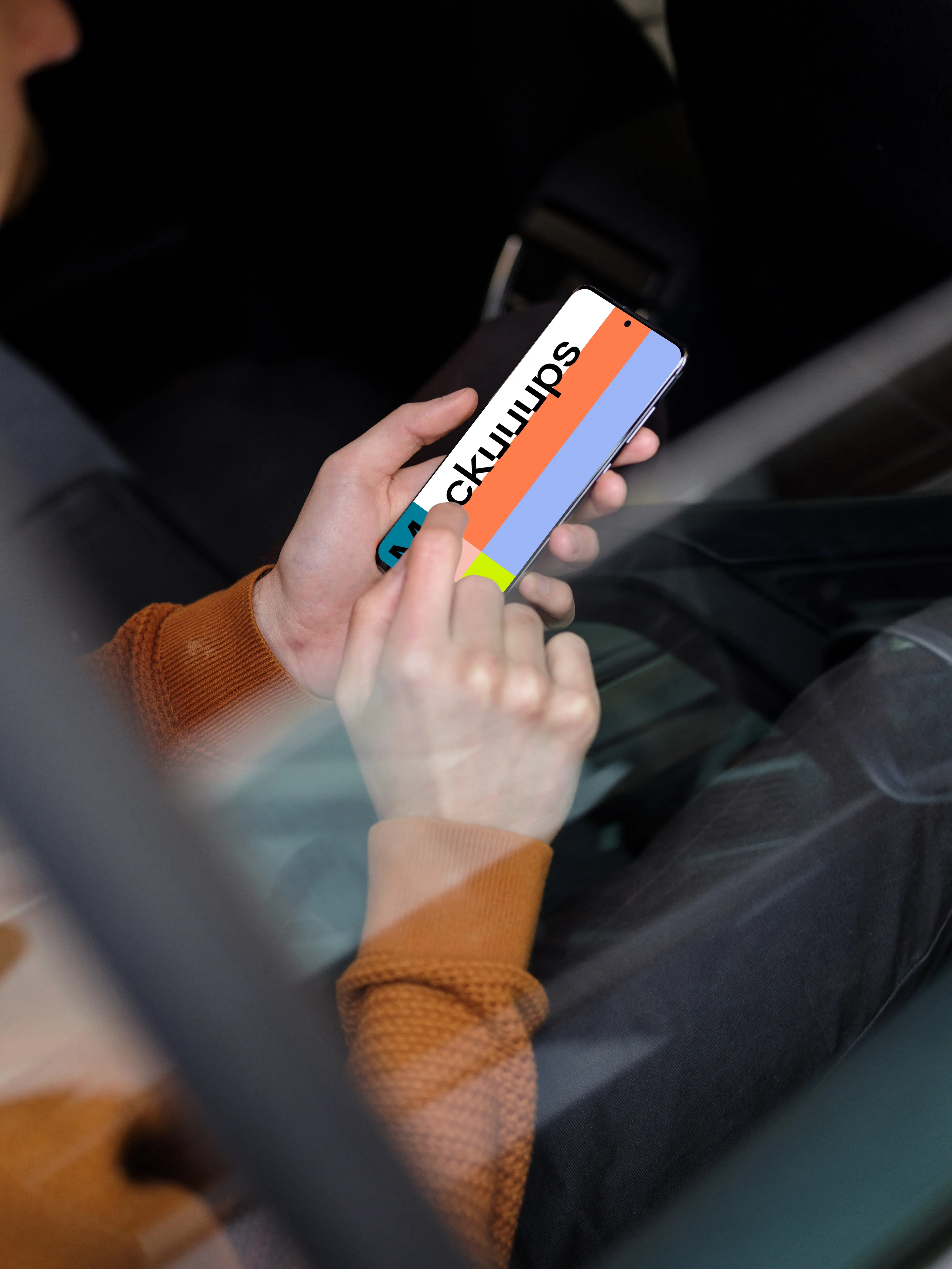 Over the shoulder mockup of passenger tapping on Samsung S20 mockup