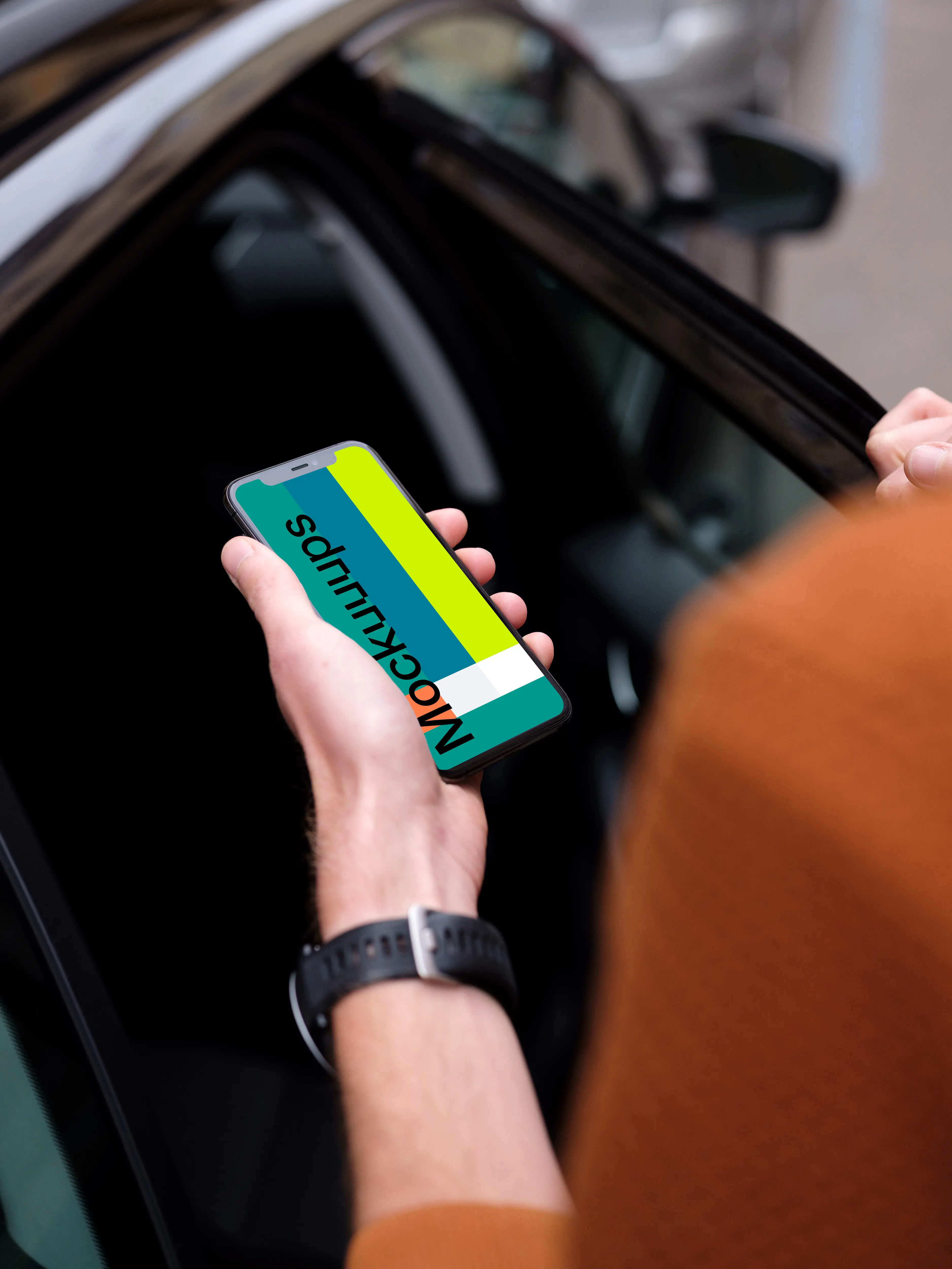 Passenger entering a car holding an iPhone 11 mockup