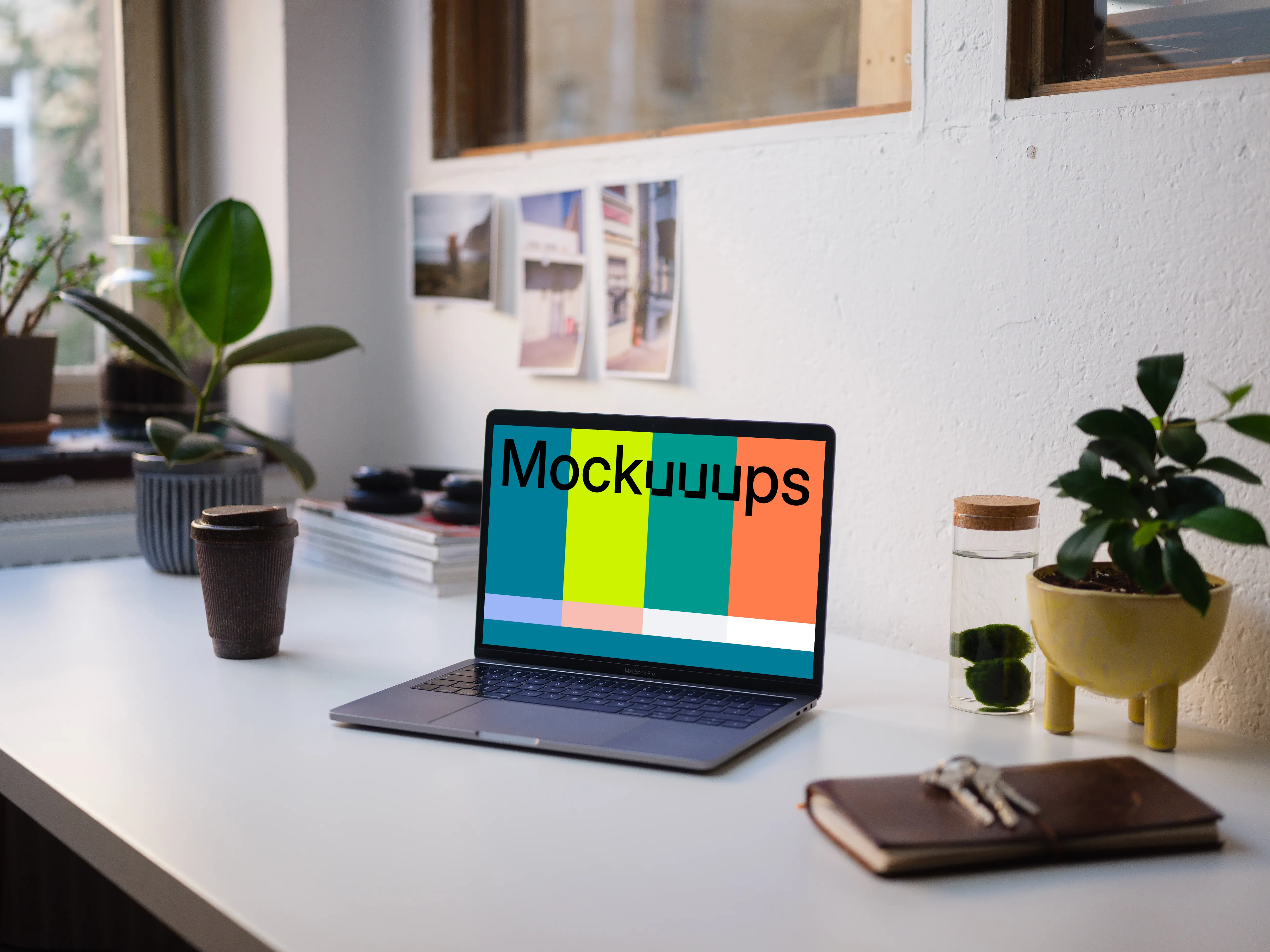 Side view of the Macbook Pro mockup on white table