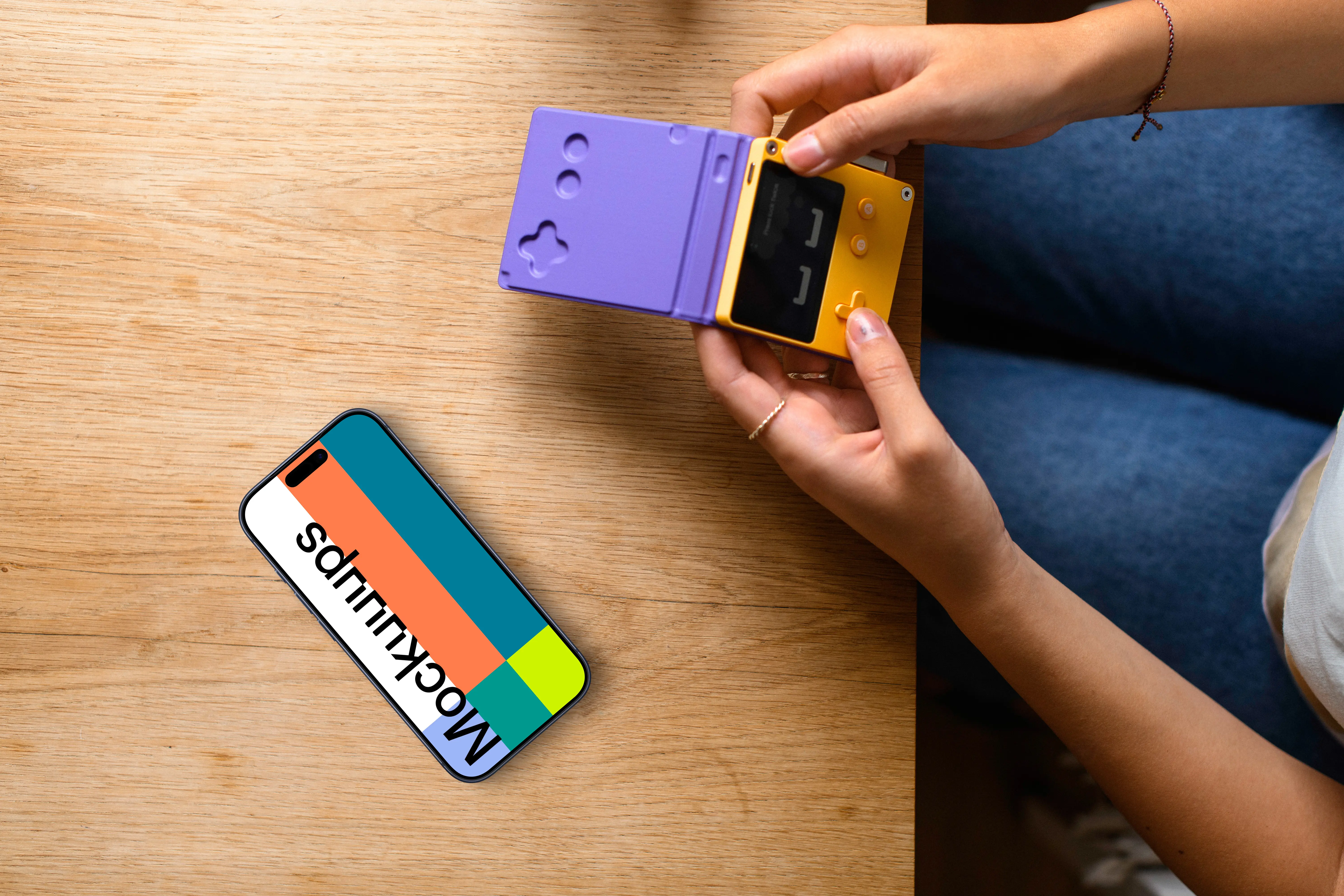Smartphone and portable game console mockup at home