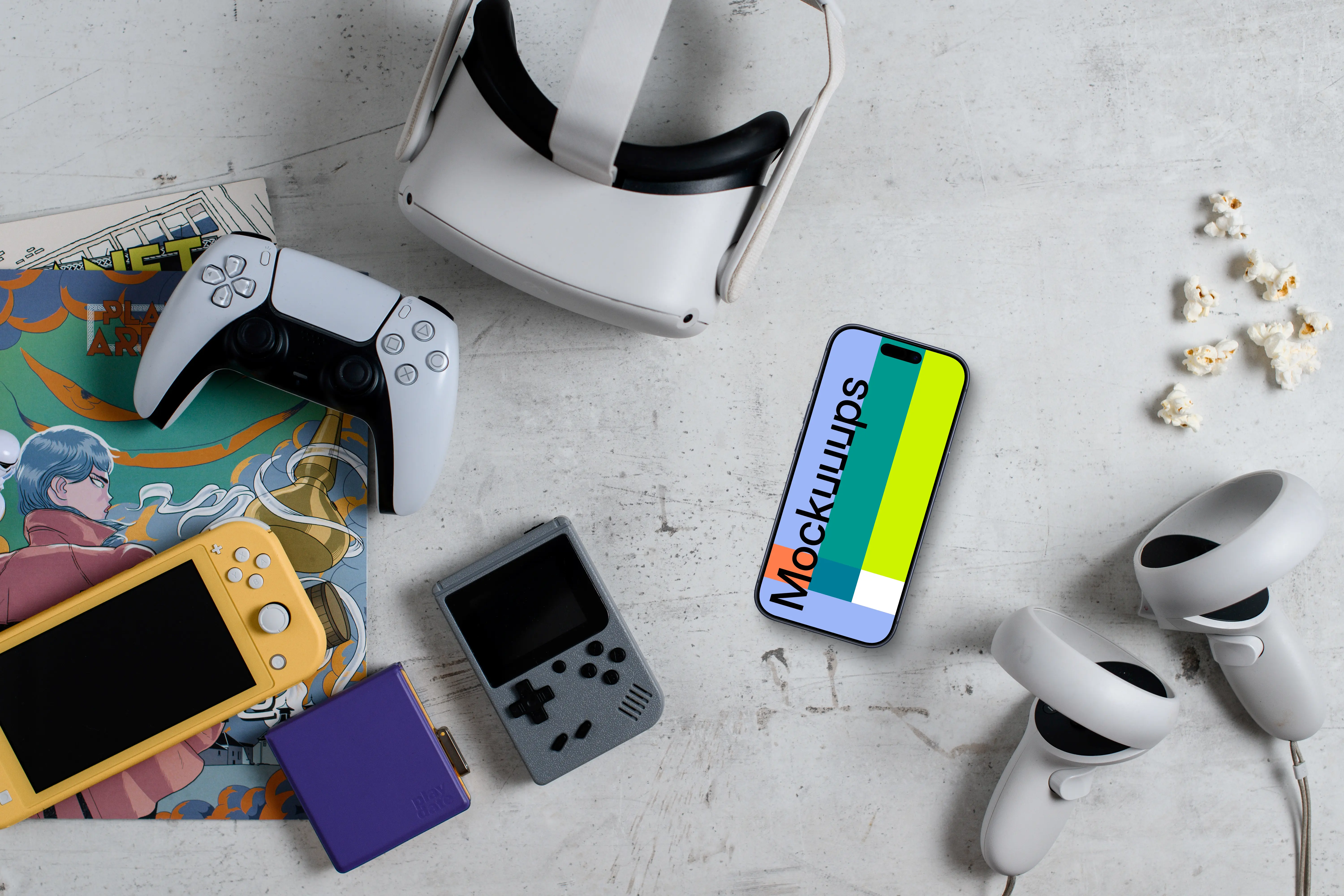 Smartphone mockup amidst gaming gear and snacks