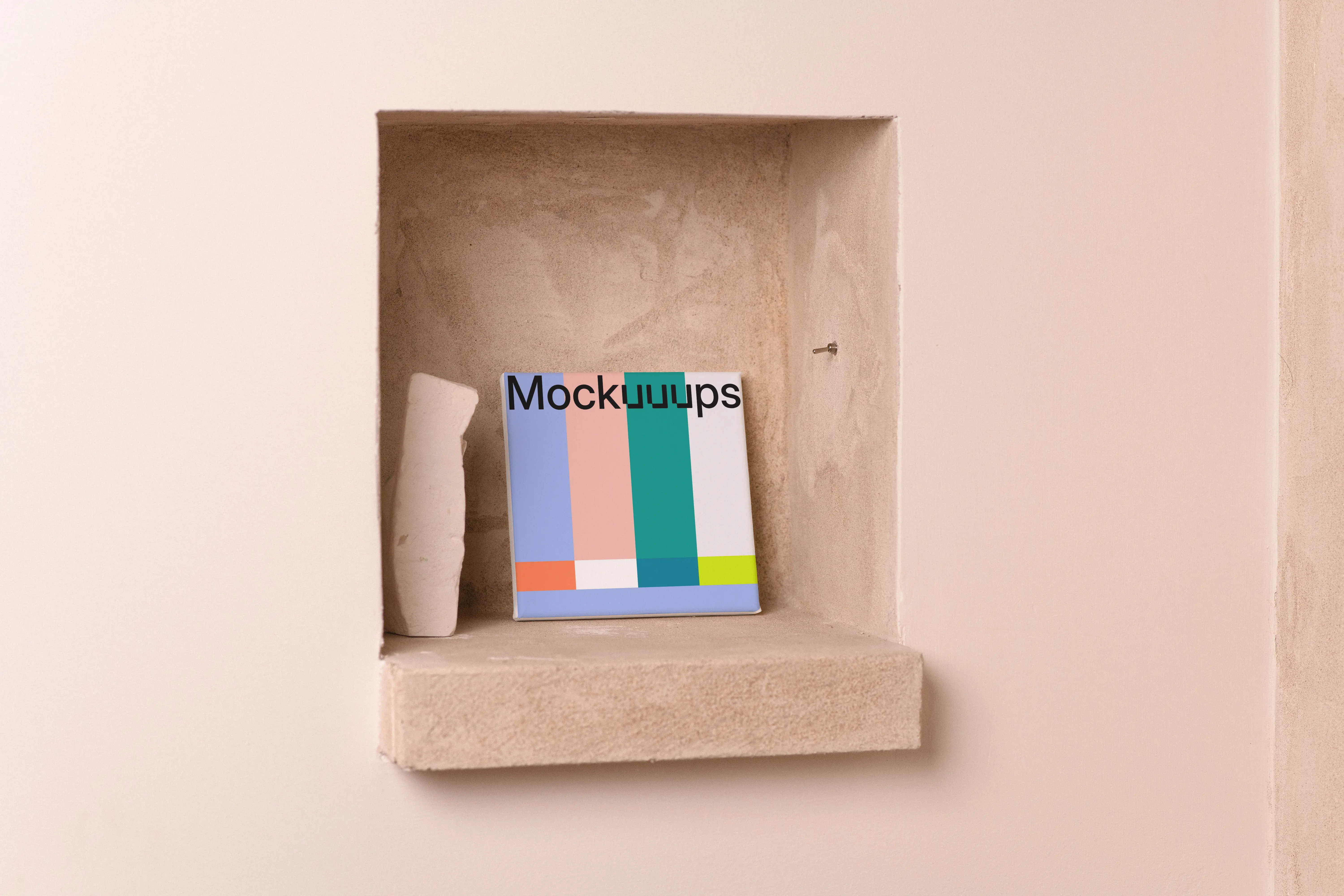 Square poster mockup on a beige recessed shelf