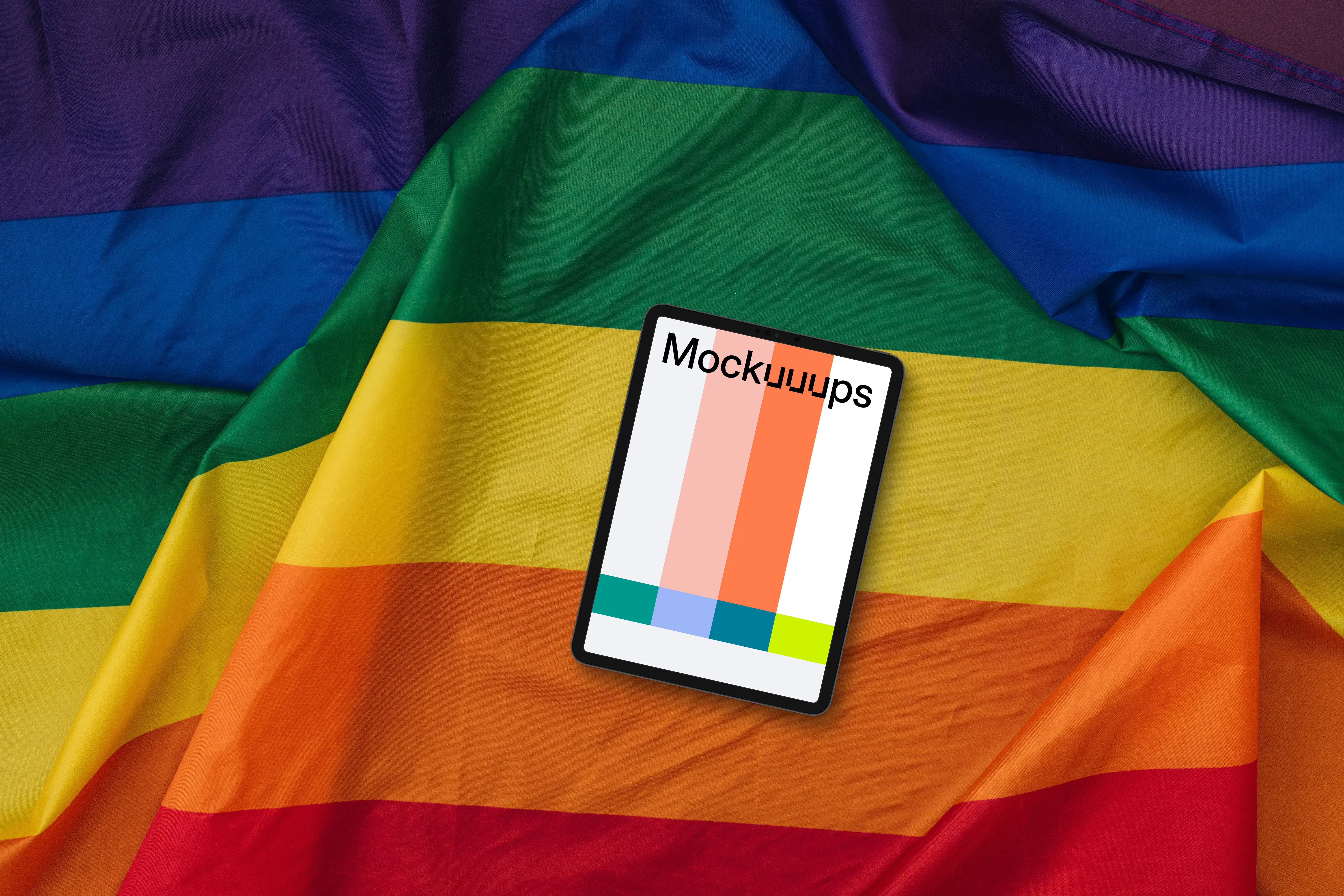 Tablet mockup on a large pride flag