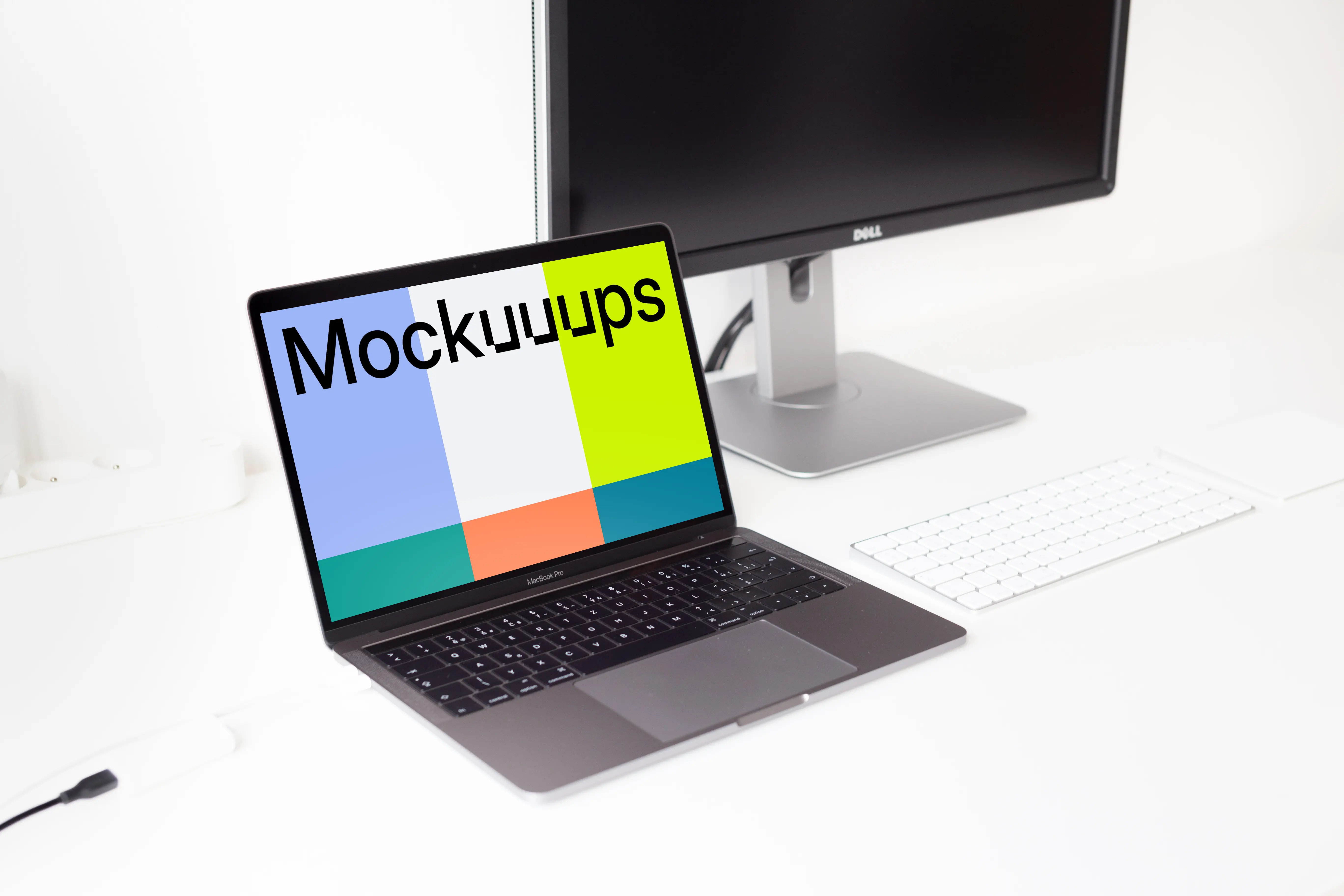 Workplace with a Macbook Pro mockup and display