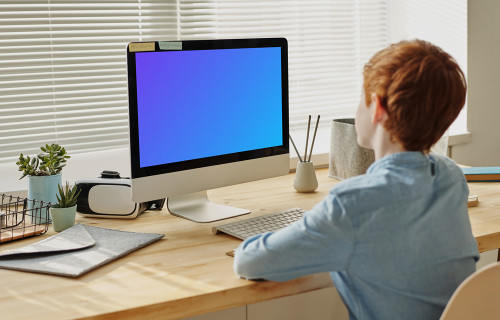 Child using computer mockup