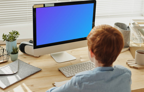 Child working on computer mockup