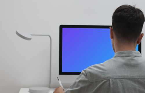 Mockup of a user working on an iMac