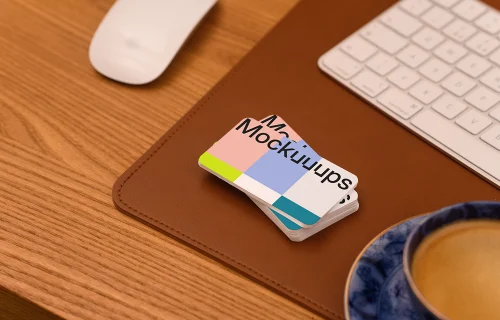 Business card mockup on a leather desk pad