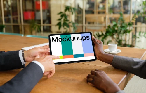 Businesspeople working on an iPad Air mockup