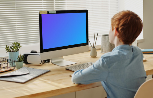 Child using computer mockup