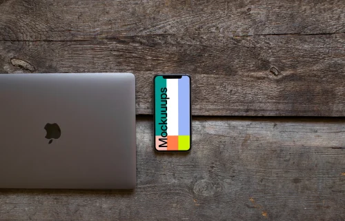 Closed Macbook Air with iPhone XS mockup