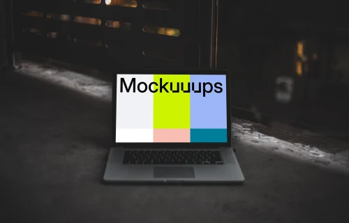 Dark mockup scene with Macbook Pro