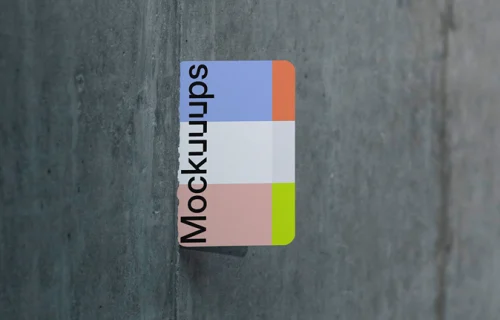 EU business card mockup sticked to the concrete wall