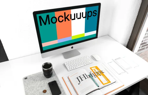 iMac mockup on white working desk