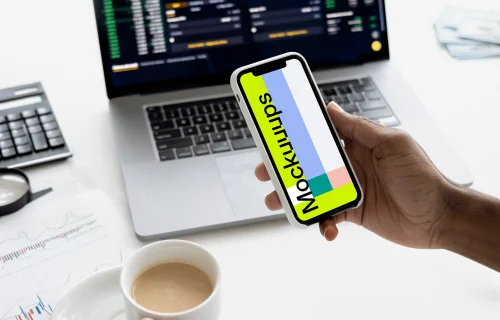 iPhone 12 mockup held by a man