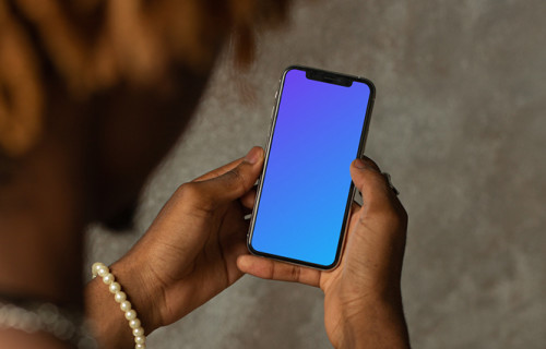 iPhone 12 Pro mockup held by user with both hands