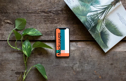 iPhone XS mockup with a book about plants