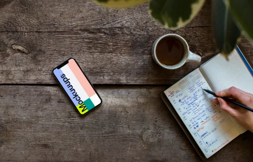 iPhone XS mockup with a journal on the right side