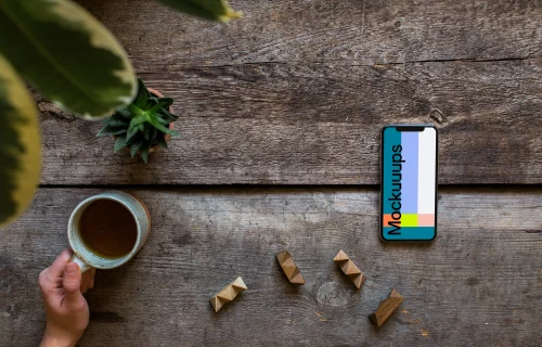 iPhone XS mockup with a tea on the left side