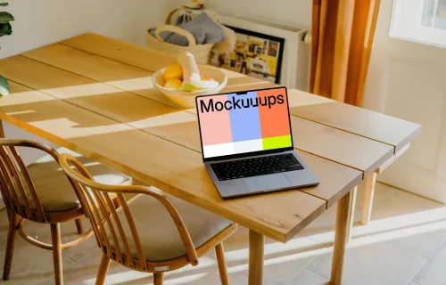 MacBook Pro mockup at dining table setup