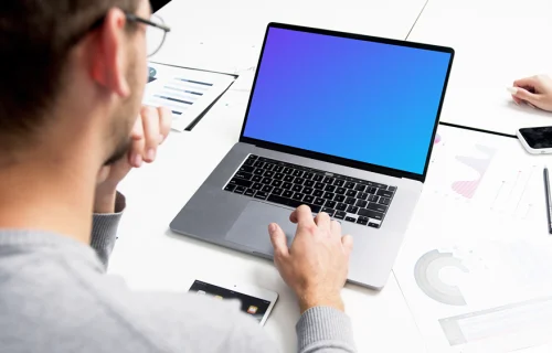 MacBook Pro mockup in a meeting