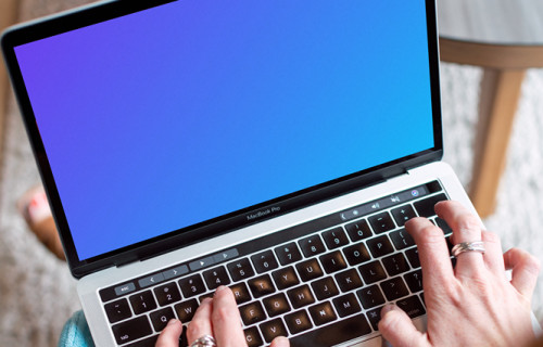 MacBook Pro mockup on a woman's legs
