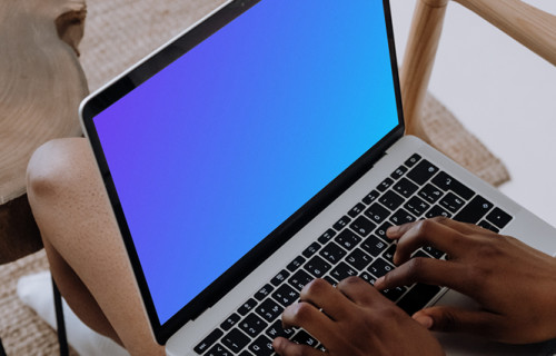 MacBook Pro mockup on a young ladies lap