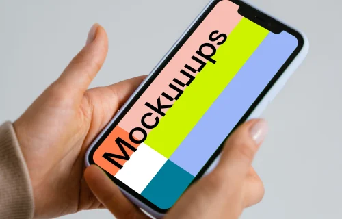 Minimalistic iPhone mockup held by user