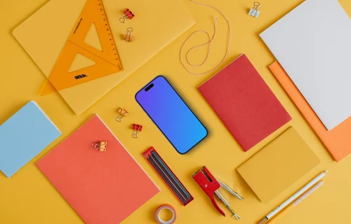 Phone mockup with back to school elements around
