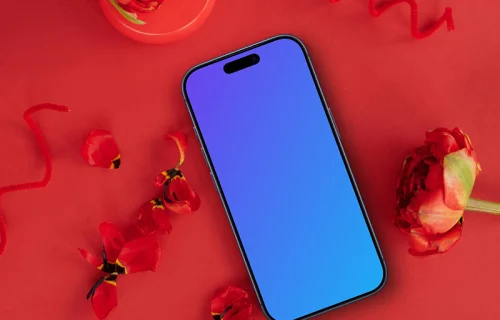 Smartphone mockup in a red scene with flowers
