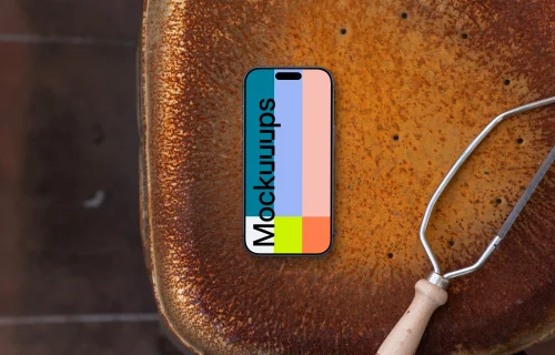 Smartphone mockup on a rustic metal chair