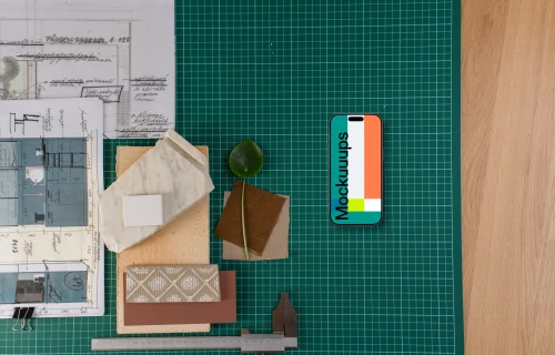 Smartphone mockup on architect's table