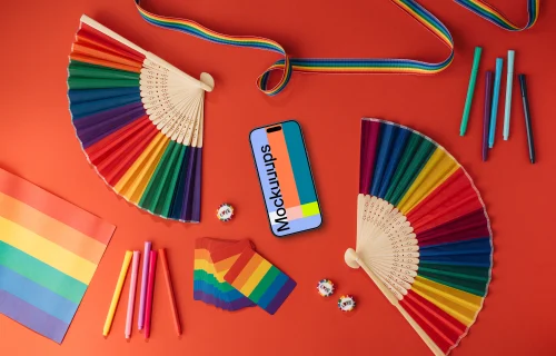 Smartphone mockup surrounded by rainbow items