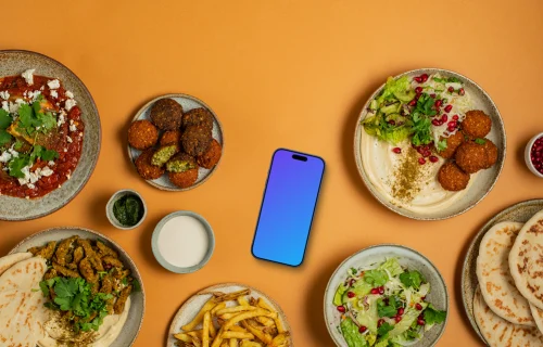 Smartphone mockup with Middle Eastern dishes