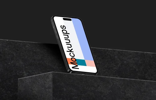 Standing smartphone mockup on marble block - Left View