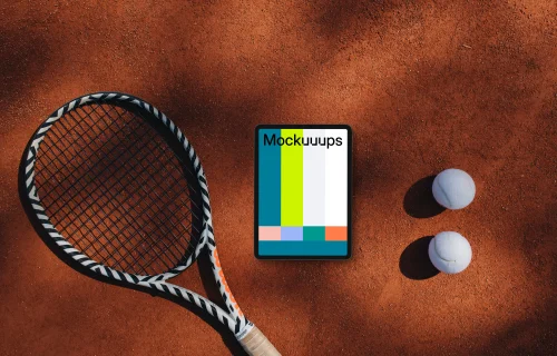 Tablet mockup between tennis racket and balls
