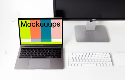 Top view mockup of the Macbook Pro on the white table