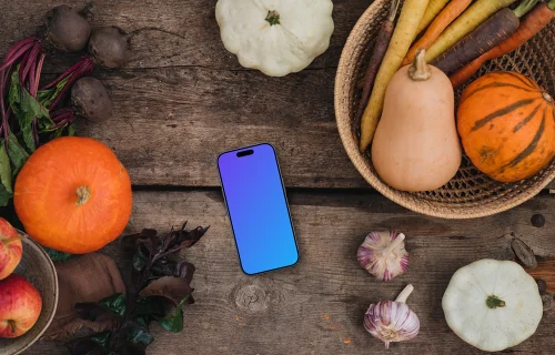Top view of smartphone mockup on the kitchen desk
