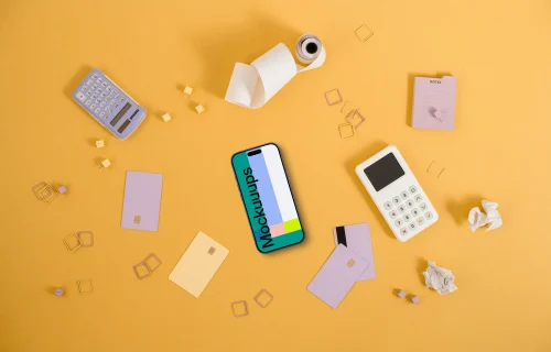 Yellow background with payment terminal and an iPhone mockup