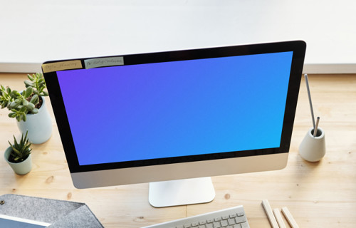Young girl taking notes from an iMac mockup