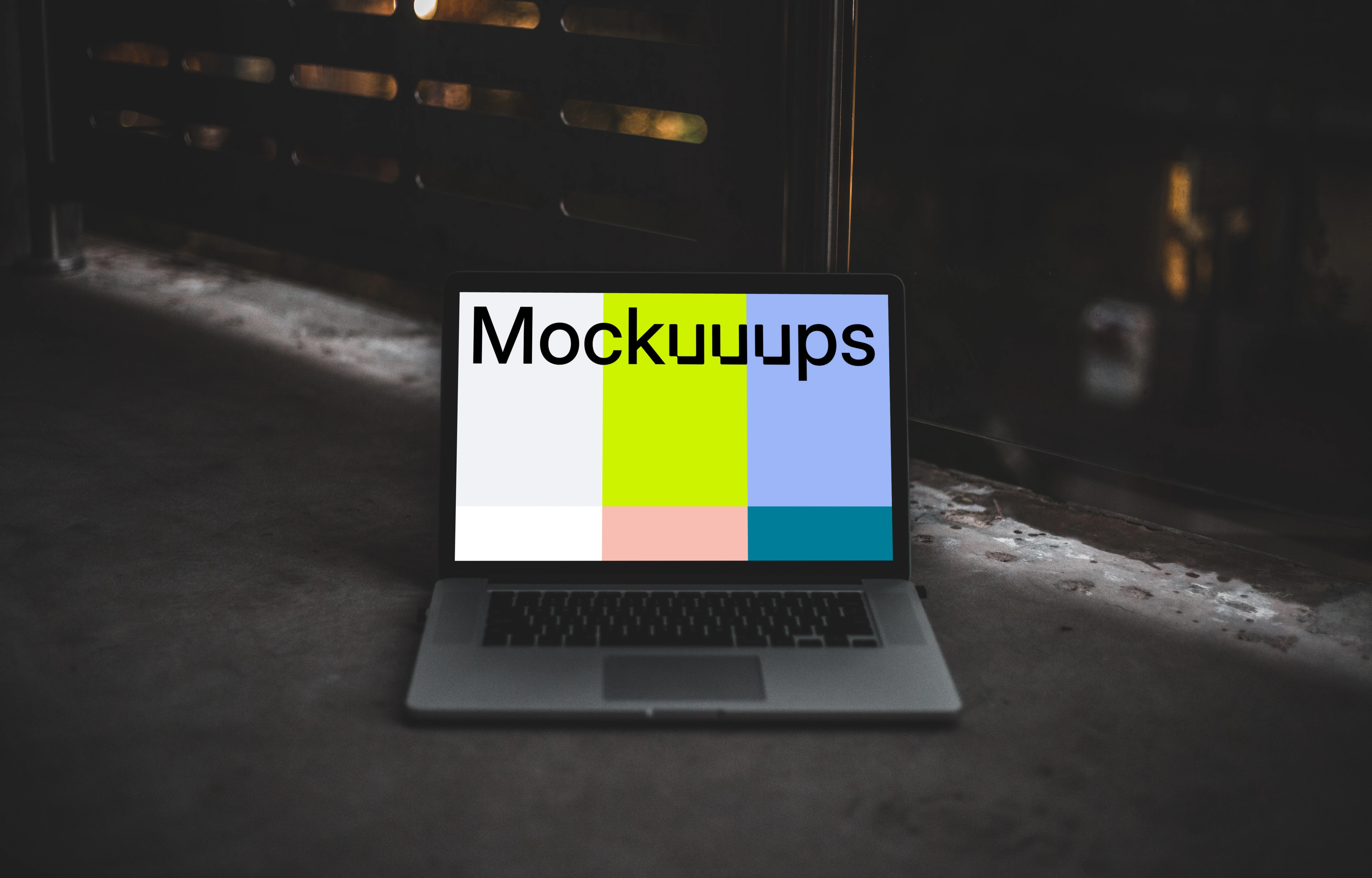 Dark mockup scene with Macbook Pro