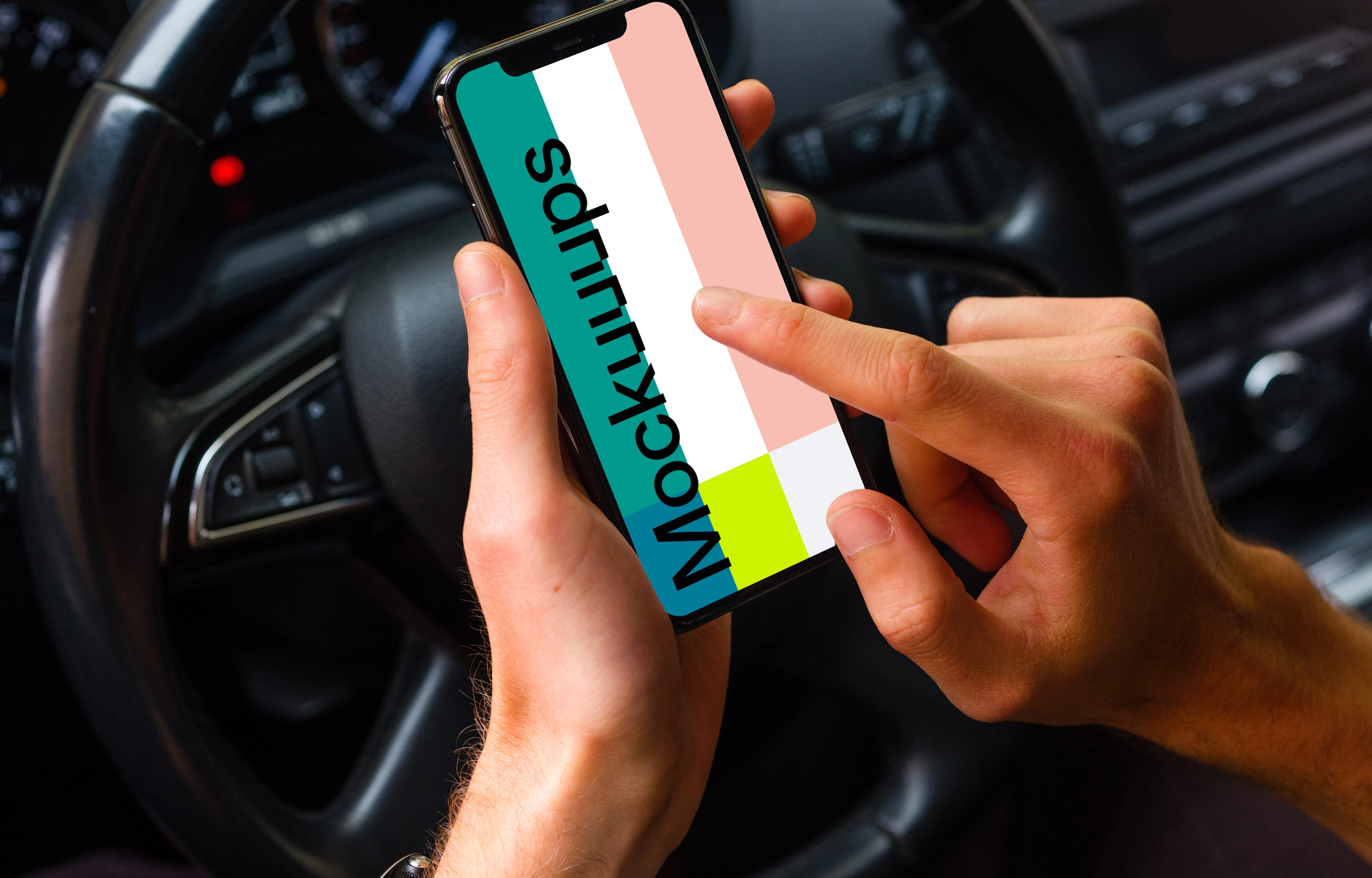 Driver tapping iPhone 11 mockup in front of steering wheel