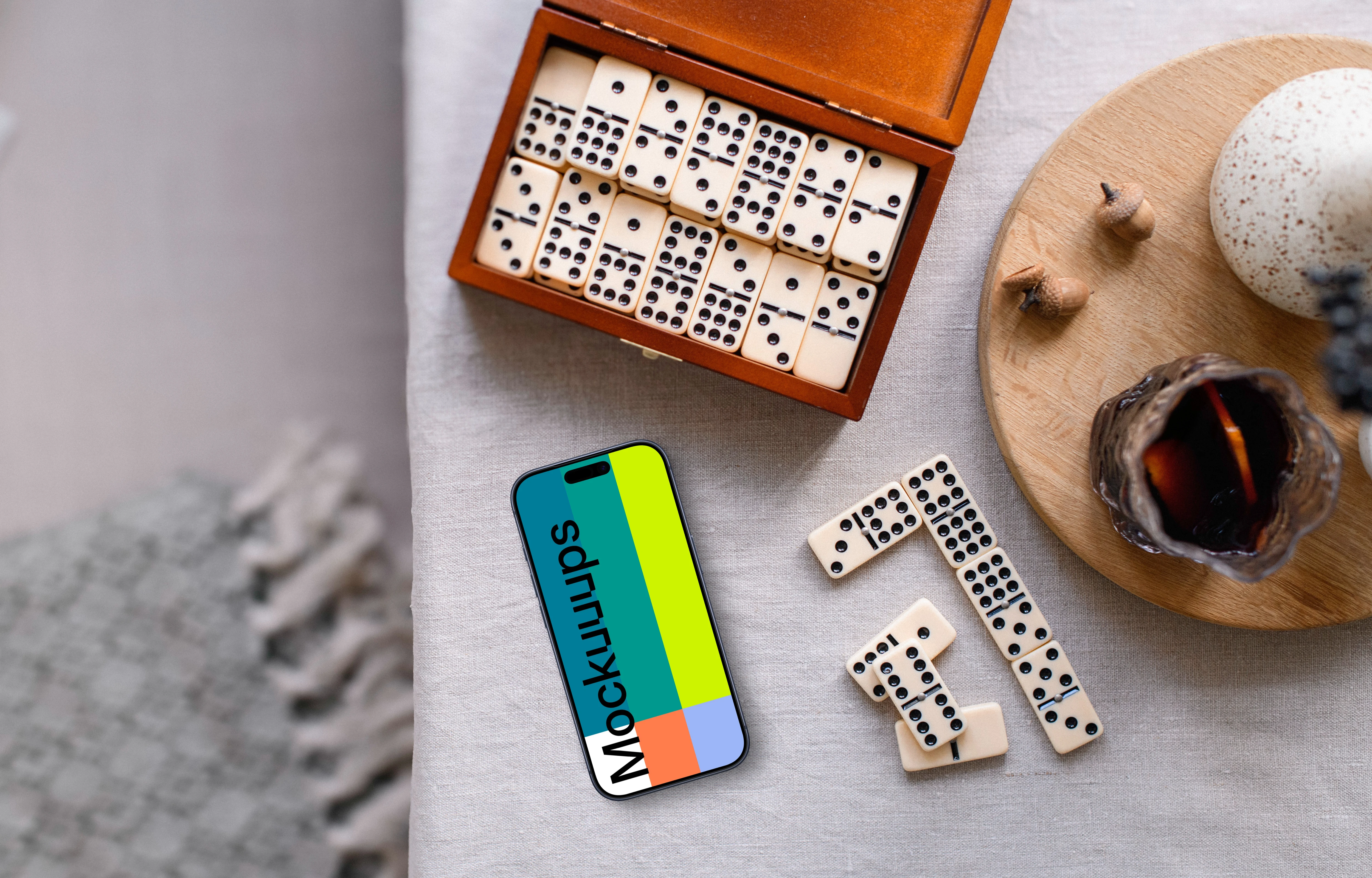 iPhone mockup and dominoes