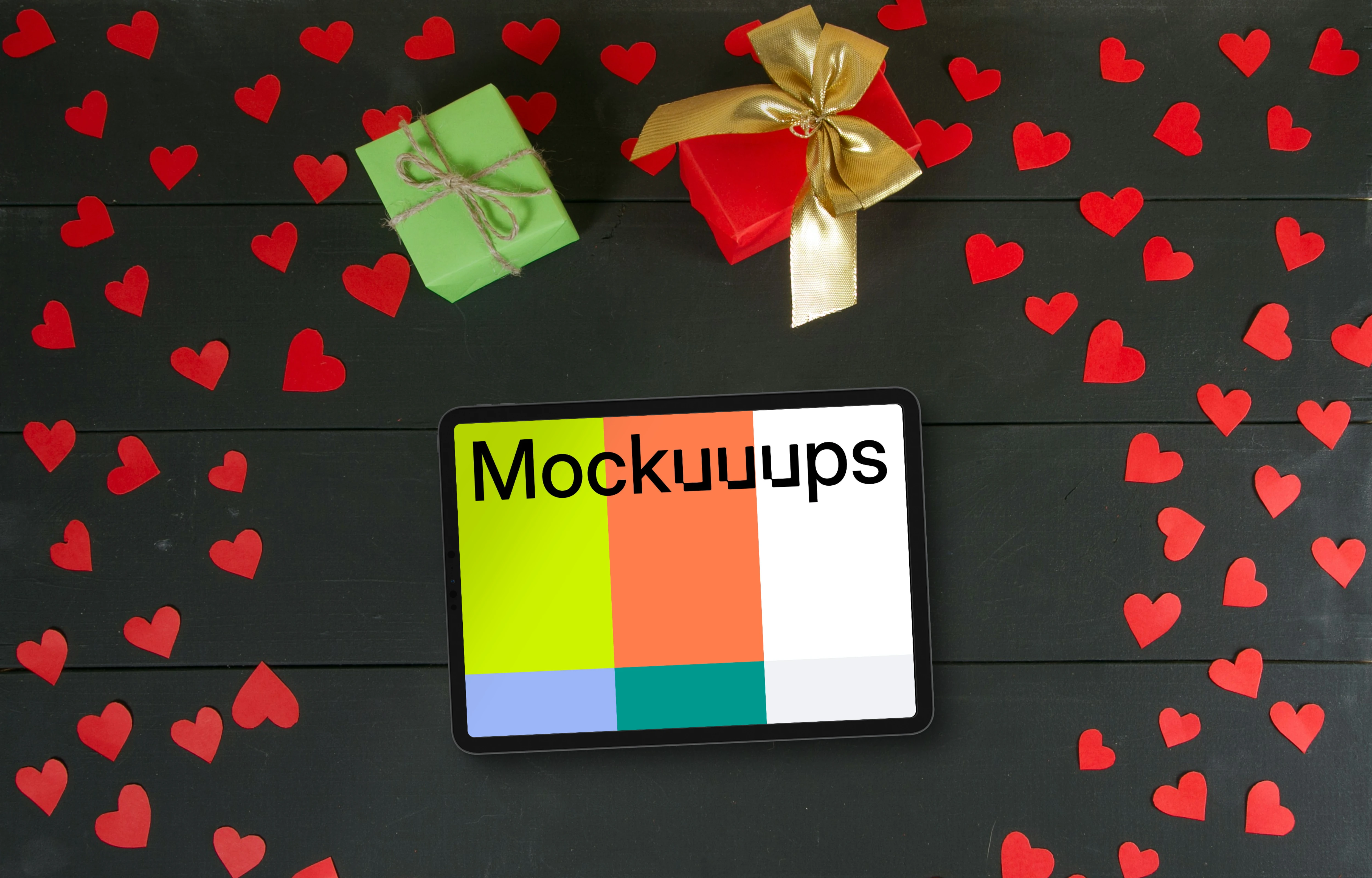 Tablet mockup surrounded by hearts and gifts