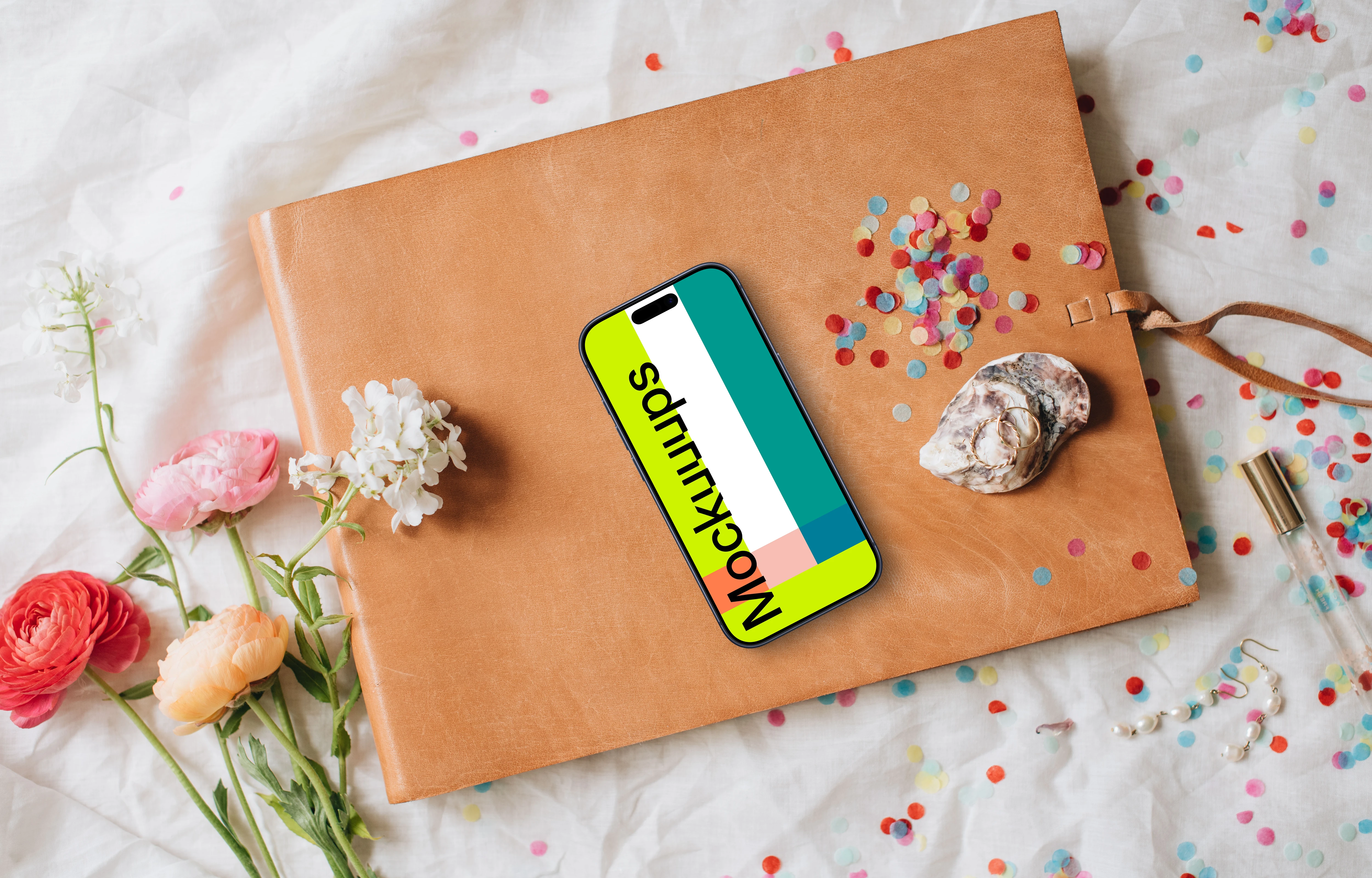 Wedding iPhone mockups embraced by flowers and confetti